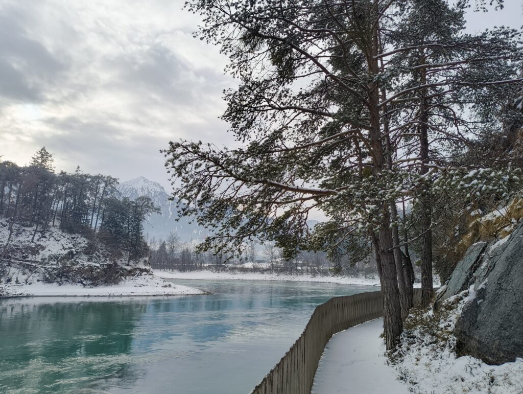 Packraft, paddle, life jacket, helmet and drybag as winter packraft checklist